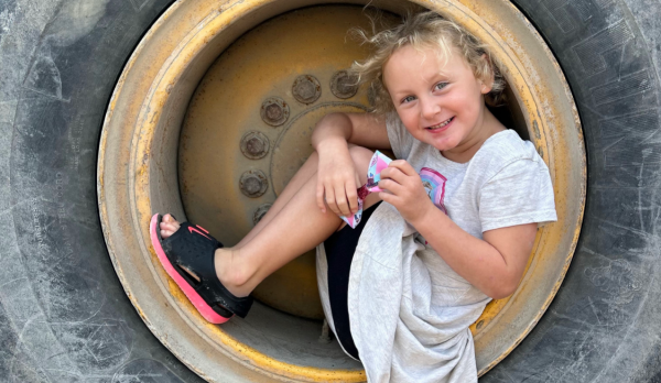 Picture of a girl in a tire 